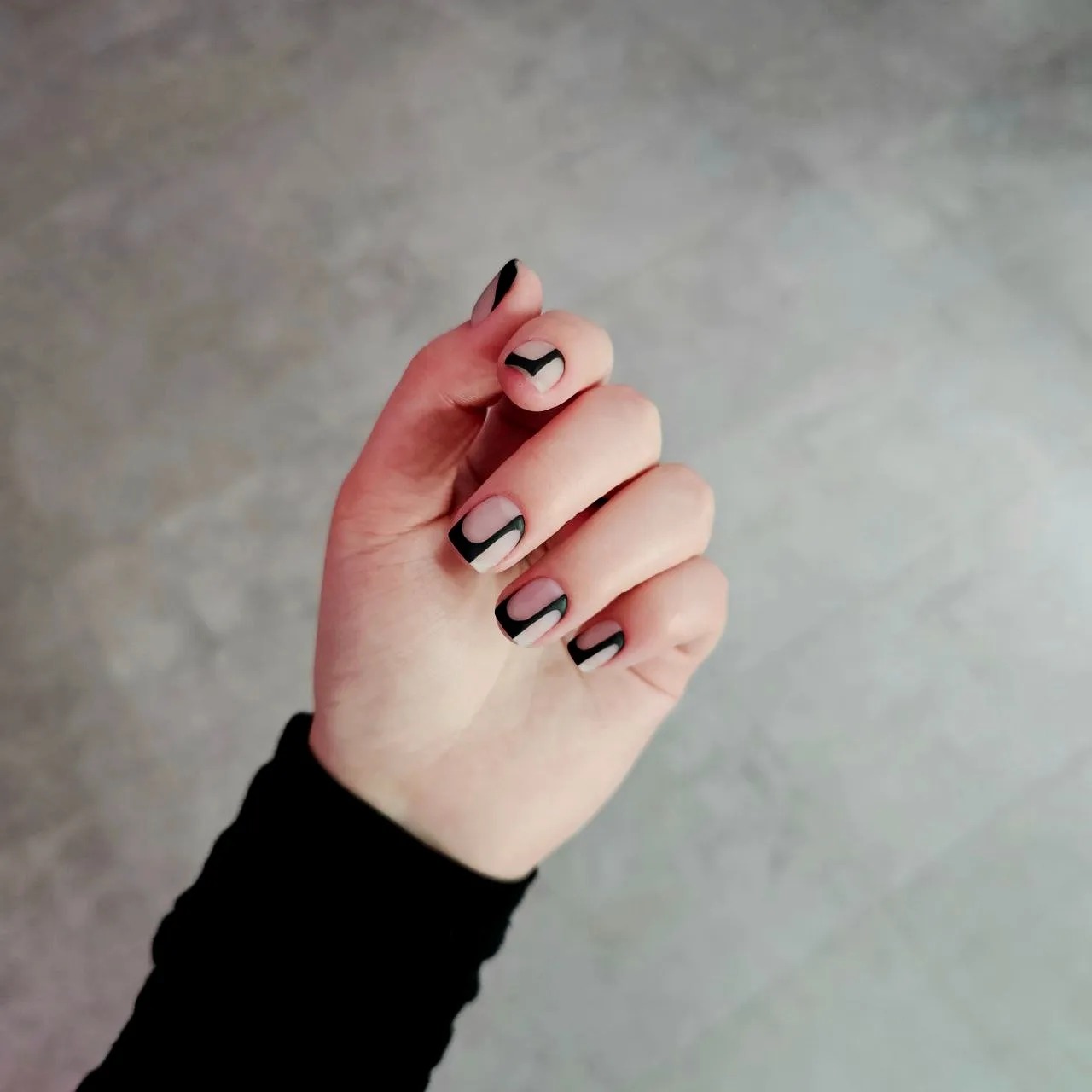 Black geometric French nail art